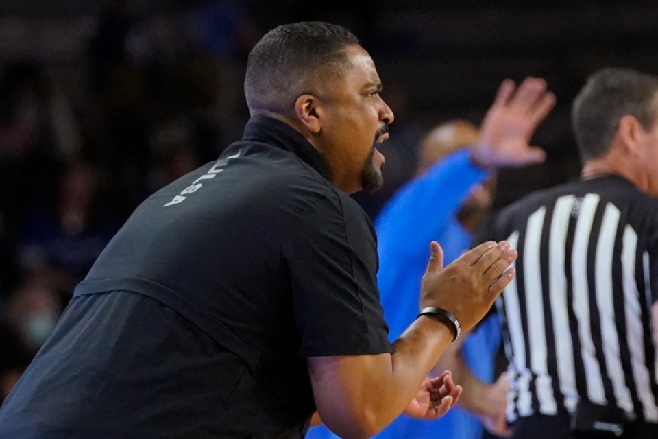 <strong>Tulsa head coach Frank Haith instructs his players from the&nbsp; sidelines against the Memphis Tigers on Jan. 23, in Tulsa, Okla.&nbsp;When Memphis opens its basketball season in 2022, Haith will be in FedExForum as a new Tiger assistant.</strong> (Sue Ogrocki/Associated Press file)