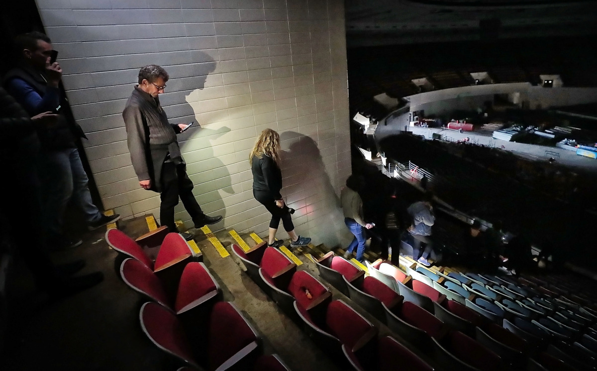 <strong>Cam McCaa (left) and other interested Memphians decend from the press box area during a tour of the Mid-South Coliseum on March 22, 2019, conducted by the Coliseum Coalition to educate members of the public on the site&rsquo;s history, present condition and the possibilities of development in the future.</strong> (Jim Weber/Daily Memphian)