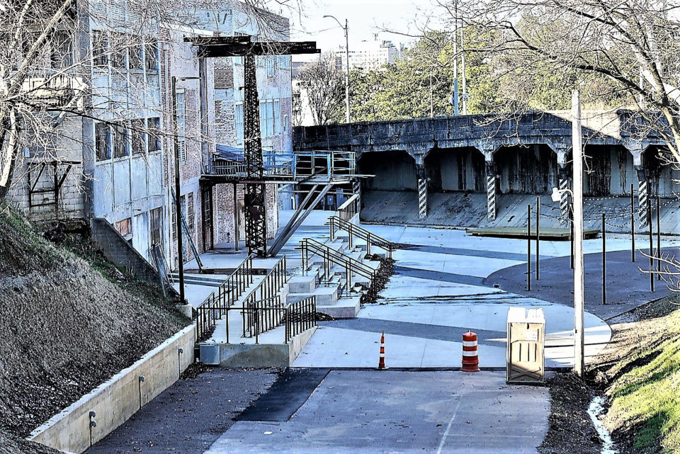 <strong>The north end, or Phase 1, of The Ravine is complete and awaits an opening date. The future Memphis Made Brewing Co. brewery and taproom (left) lines the linear park.</strong> (Tom Bailey/The Daily Memphian file)