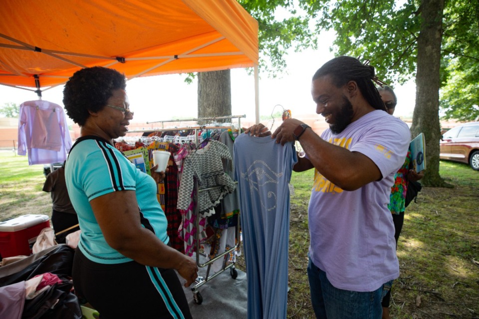 <strong>Donna Turner chats with Tim Dodson at Douglass Park during the Juneteenth celebration on Friday, June 17, 2022.</strong> (Ziggy Mack/Special to The Daily Memphian)