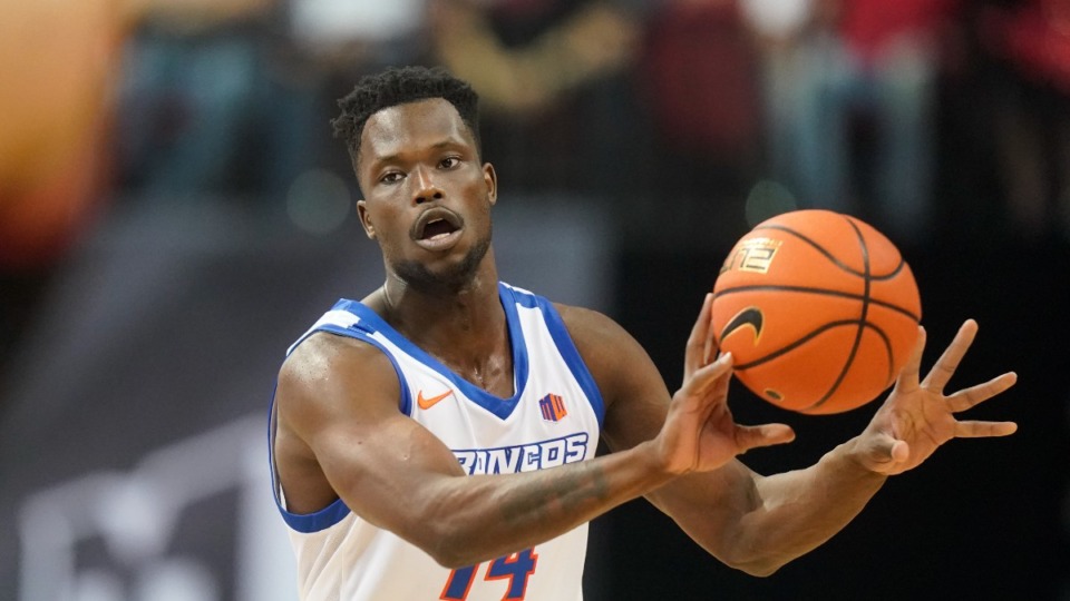 <strong>Boise State transfer Emmanuel Akot (14) committed to the University of Memphis Sunday.</strong> (AP file photo/Rick Bowmer)