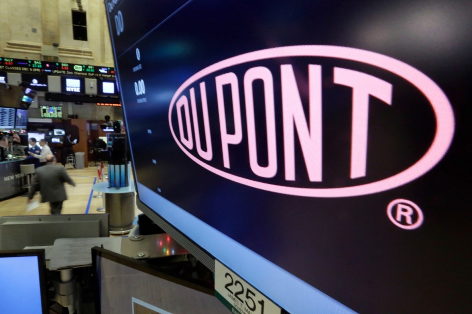 <strong>In this Dec. 9, 2015, file photo, the company name of Dupont appears above its trading post on the floor of the New York Stock Exchange.&nbsp;, The Chemours Company&nbsp;is a spinoff of DuPont, a Delaware-based company.</strong> (AP Photo/Richard Drew, File)