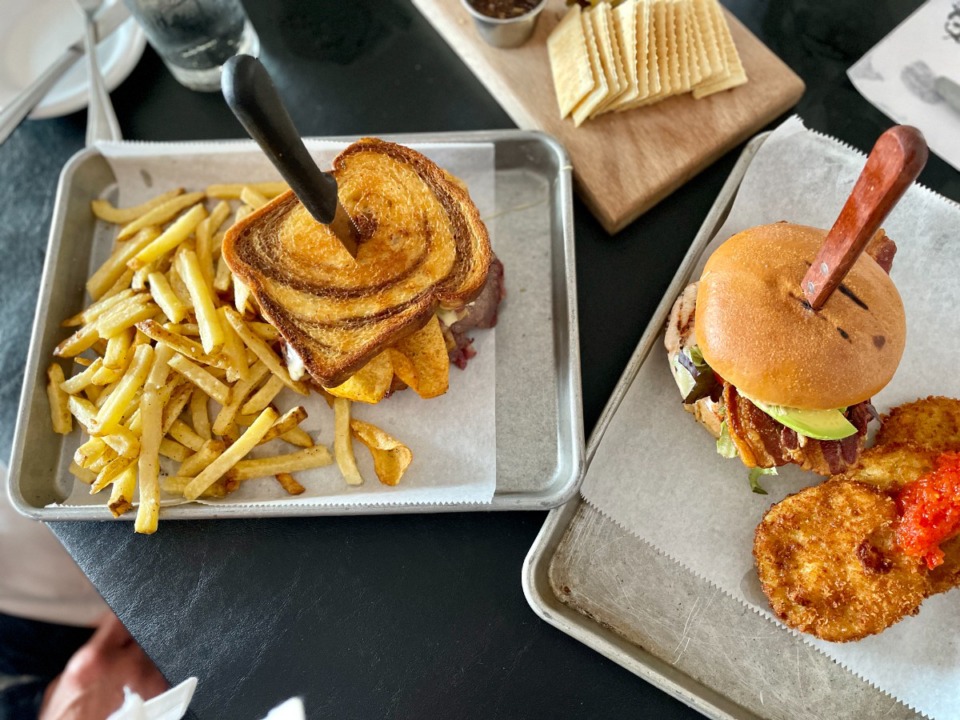 <strong>A pastrami sandwich with fries, and a chicken club with fried green tomatoes are two of the items on the new lunch menu at Magnolia &amp; May.</strong> (Jennifer Biggs/The Daily Memphian)