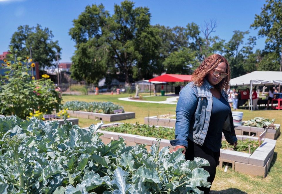 <strong>Latonya Taylor checks out the new community garden Catholic Charities of West Tennessee June 23, 2022.</strong> (Patrick Lantrip/Daily Memphian)