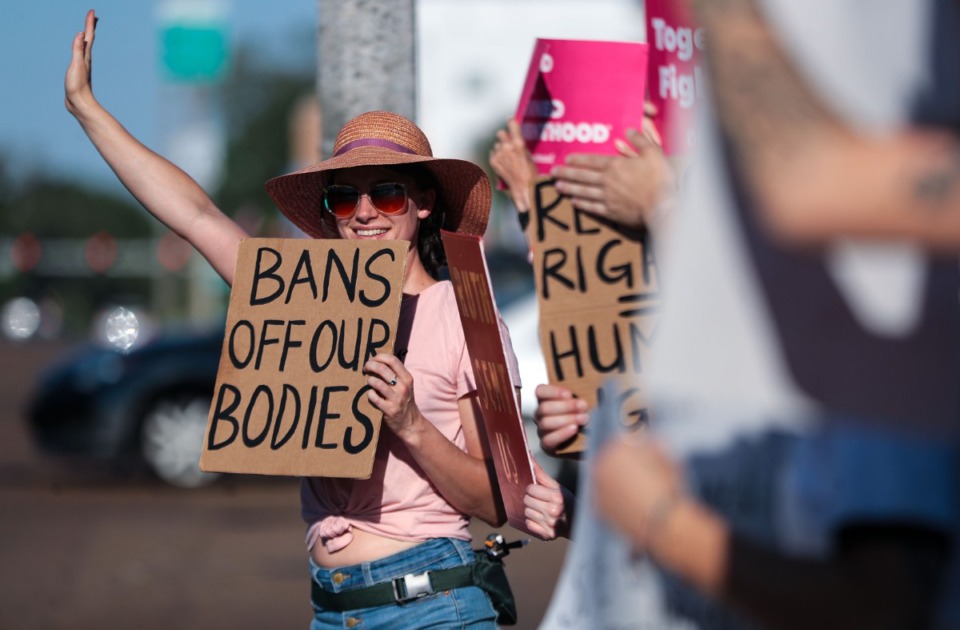 <strong>Dozens of protesters packed all sides of the intersection of Poplar Avenue and McLean Boulevard to speak out against the overturning of Roe v. Wade on June 24, 2022.</strong> (Patrick Lantrip/Daily Memphian)