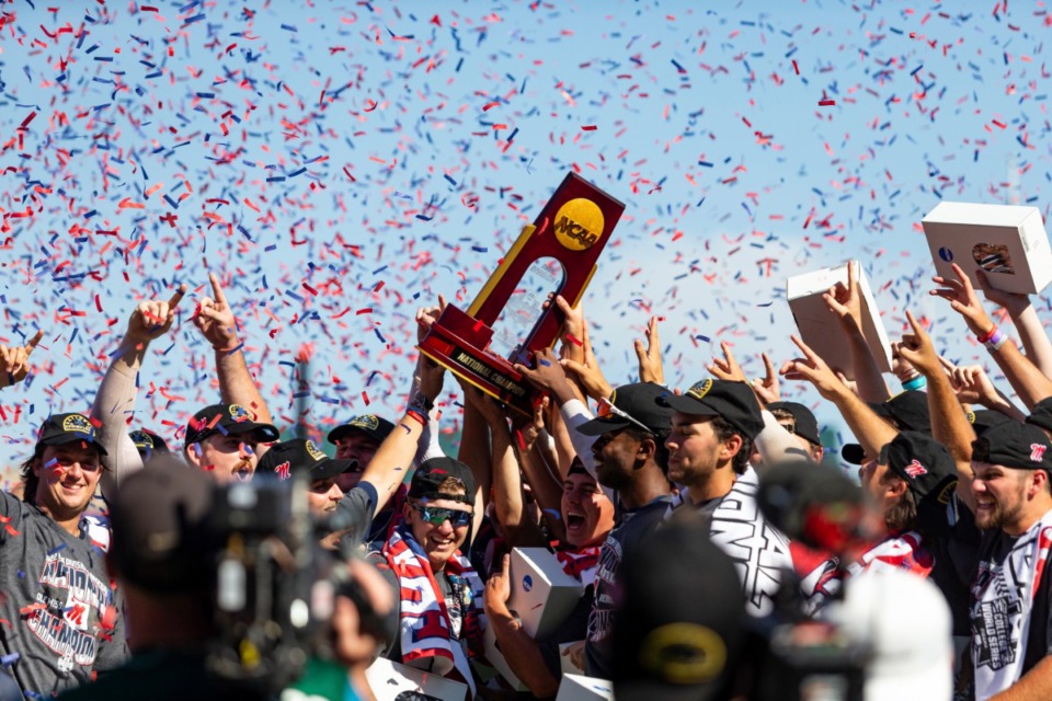 <strong>Mississippi players hold up the trophy after a win over Oklahoma in Game 2 of the NCAA College World Series baseball finals, Sunday, June 26, 2022, in Omaha, Neb.</strong> (AP Photo/John Peterson)