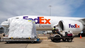 <strong>A FedEx driver ferries crates filled with humanitarian aid to be loaded on a plane and shipped to Ukraine in March.&nbsp;FedEx has built one of the most connected trade networks in the world.</strong>&nbsp;(Patrick Lantrip/Daily Memphian file)