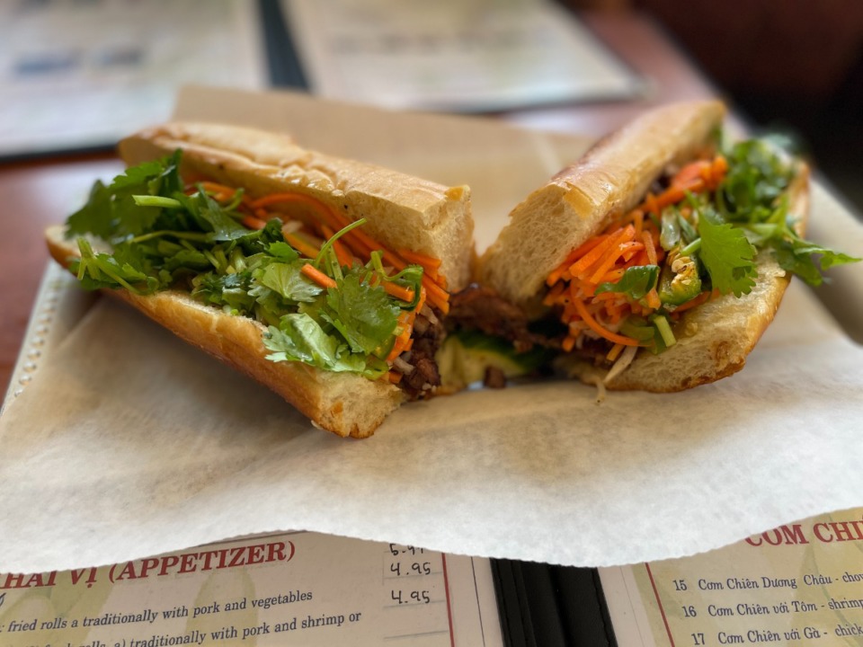 <strong>At Pho So 8, the banh mi features charred pork piled on excellent bread, with a generous handful of fresh herbs and slightly sweet and tangy pickled vegetables. It&rsquo;s delicious and filling, and it&rsquo;s $6.99 for a small or $12.99 for a large.</strong> (Jennifer Biggs/The Daily Memphian)