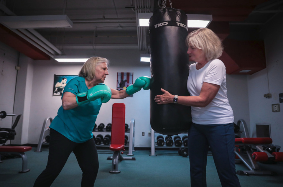 <strong>Judy Jenkins trains with Ginger Acuff at the Memphis Police boxing gym, June 22, 2022.</strong> (Patrick Lantrip/Daily Memphian)