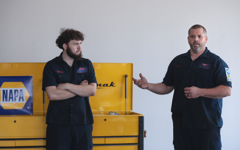 <strong>Steven Gaboriault (right) speaks at a ceremony honoring Gateway Tire's first graduating cohort from its Technician Training Program, June 30, 2022.</strong> (Patrick Lantrip/Daily Memphian)
