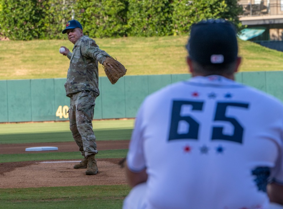 <strong>Col. John Brinkley, the vice commander of the 164th Airlift Wing of the Tennessee Air National Guard, throws out the first pitch at the Redbirds game for the Fourth of July celebration, July 1, 2022.</strong> (Greg Campbell/Special for The Daily Memphian)