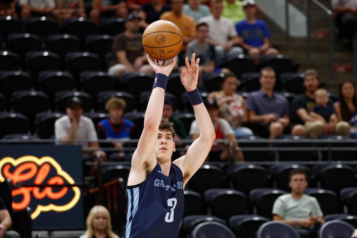 <strong>Memphis Grizzlies forward Jake LaRavia shoots a 3-pointer against the Philadelphia 76ers on July 5.</strong> (Jeff Swinger/AP)