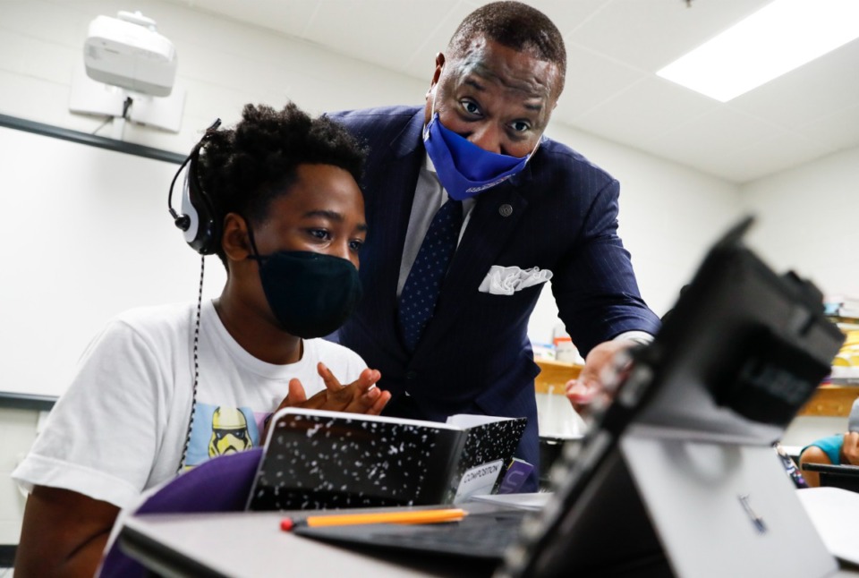 <strong>Memphis-Shelby County Schools Superintendent Joris M. Ray (right) chats with rising sixth grader Titus Simmon (left) on Monday, July 26, 2021 during summer learning academy at Lowrance K-8.</strong> (Mark Weber/The Daily Memphian)