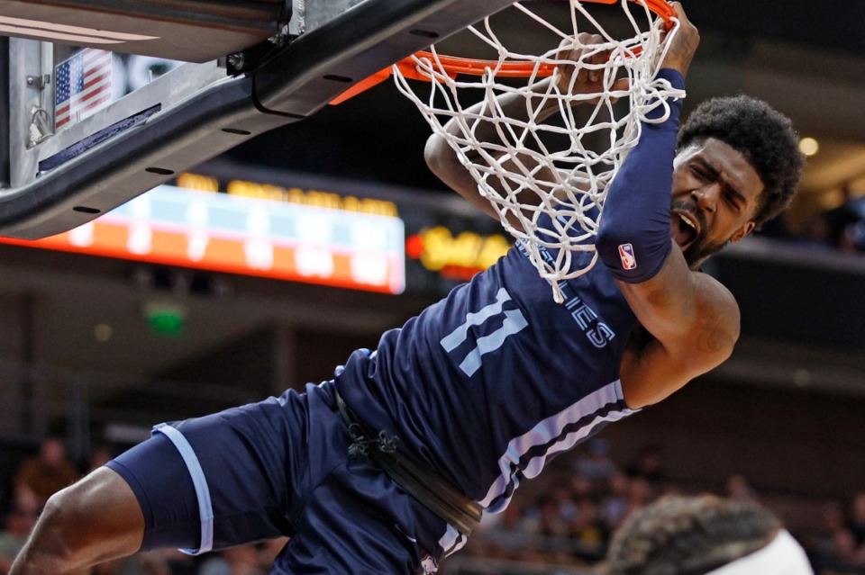 <strong>Memphis Grizzlies guard Shaq Buchanan dunks against the Oklahoma City Thunder on July 6 in Salt Lake City.</strong> (Jeff Swinger/AP)