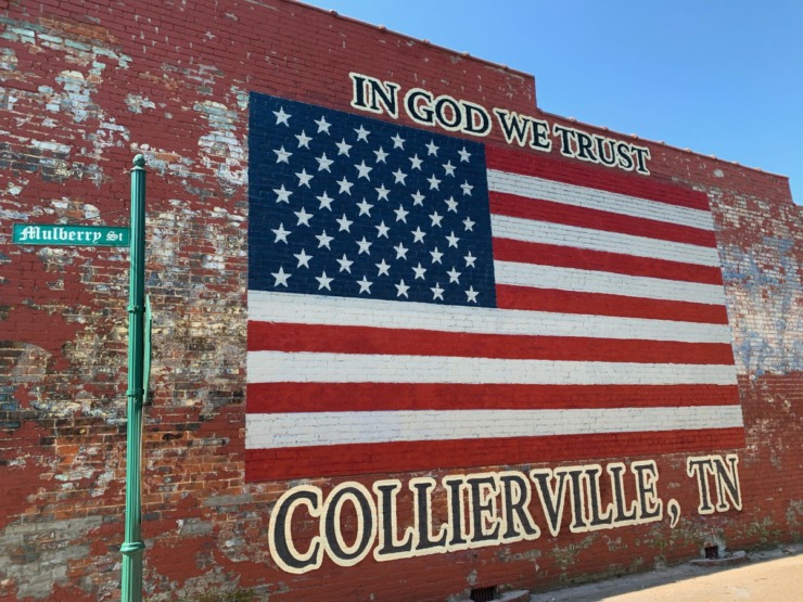 A new mural was unveiled on the west side of Collierville Square. Building owners wanted a unifying picture. (Abigail Warren/The Daily Memphian)