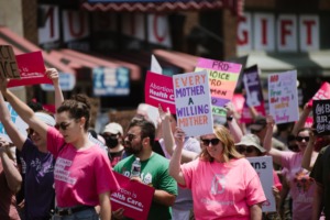 <strong>Protesters rally during a march for Planned Parenthood in Downtown Memphis on May 14. Planned Parenthood of Tennessee and North Mississippi suspended abortion services on June 28, after the U.S. Supreme Court overturned Roe v. Wade.</strong> (Lucy Garrett/Special to The Daily Memphian)