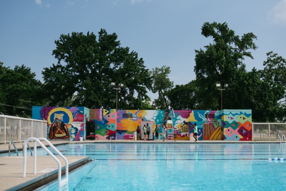 <strong>The "Slice" mural surrounding the pool in Gooch Park, painted by Jamond Bullock on Saturday, July 9, 2022.</strong> (Lucy Garrett/Special to The Daily Memphian)