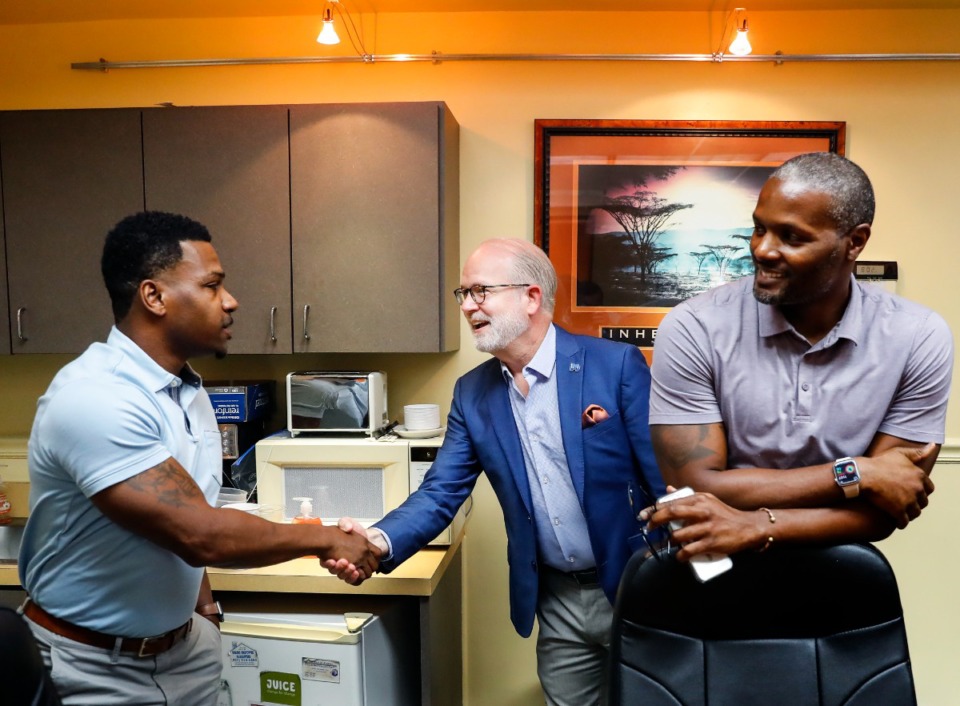 <strong>Greater Memphis Chamber Chief Economic Development Officer Ted Townsend (center) introduces himself at the Community Development Corporation of Orange Mound on Thursday, July 14.</strong> (Mark Weber/The Daily Memphian)