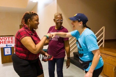 <strong>Meggan Kiel (right) congratulates first-time voter Jasmine Smith, who came with Carol Smith to cast early ballots Saturday, July 16, 2022 at Riverside Missionary Baptist Church.</strong> (Ziggy Mack/Special to The Daily Memphian)