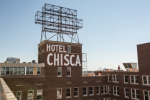 The signage scaffolding atop the 1913 Chisca building will remain, sporting a new sign from tenant LYFE Kitchen