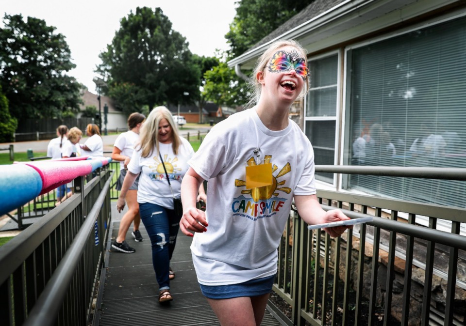 <strong>Camp Smile participate Katherine Gaut head back inside after a group picture on Tuesday, July 19, 2022.</strong> (Mark Weber/The Daily Memphian)