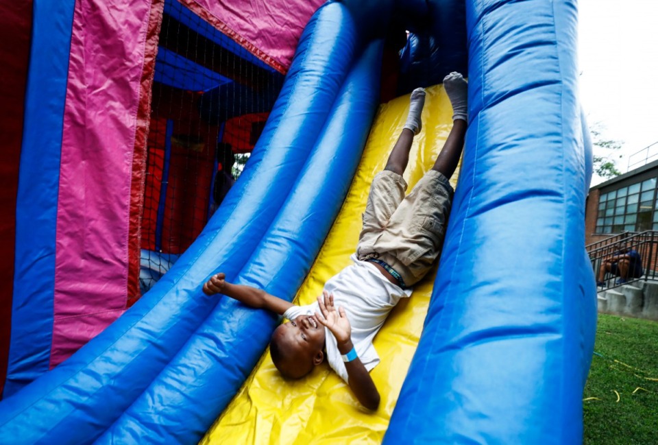 <strong>An inflatable moon bouncer gets a workout at Frayser&rsquo;s Ed Rice Community Center in 2019.</strong> (Mark Weber/Daily Memphian file)