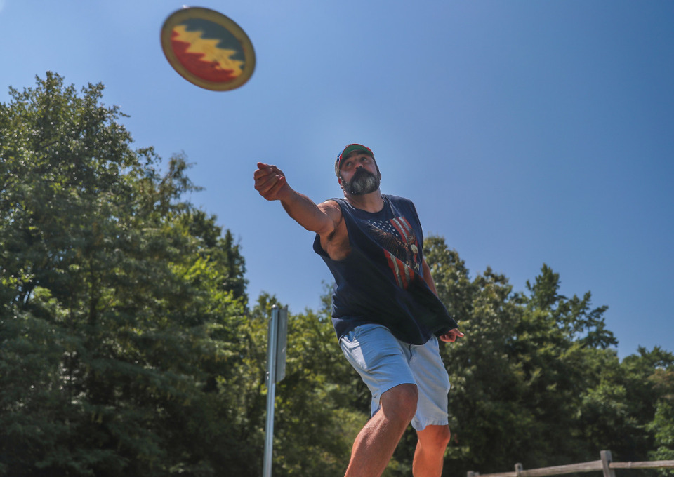 <strong>Joe Clarke plays Frisbee golf at Arlington Sports Complex, July 22, 2022.&nbsp;Over the next two to three years, lights could be added to Forrest Street Park for soccer, and there will be general updates to playground equipment across town.</strong>(Patrick Lantrip/Daily Memphian)