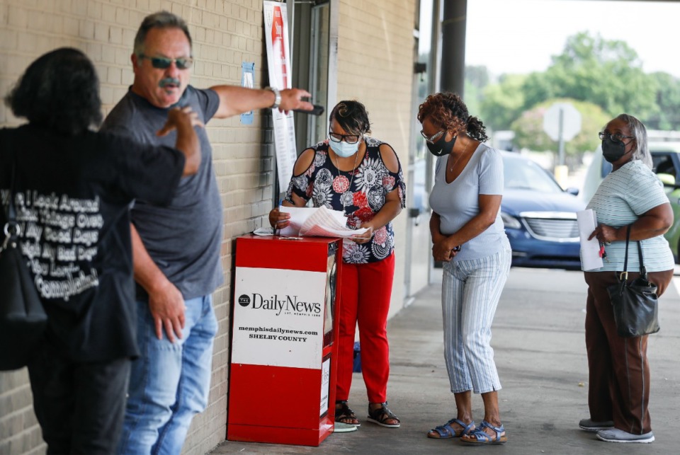 <strong>A County Clerk Office employee (middle) helps residents during the first day of the no-wait, no-line policy at the County Clerk&rsquo;s office on Tuesday, July 26, 2022, in Whitehaven.</strong> (Mark Weber/The Daily Memphian)