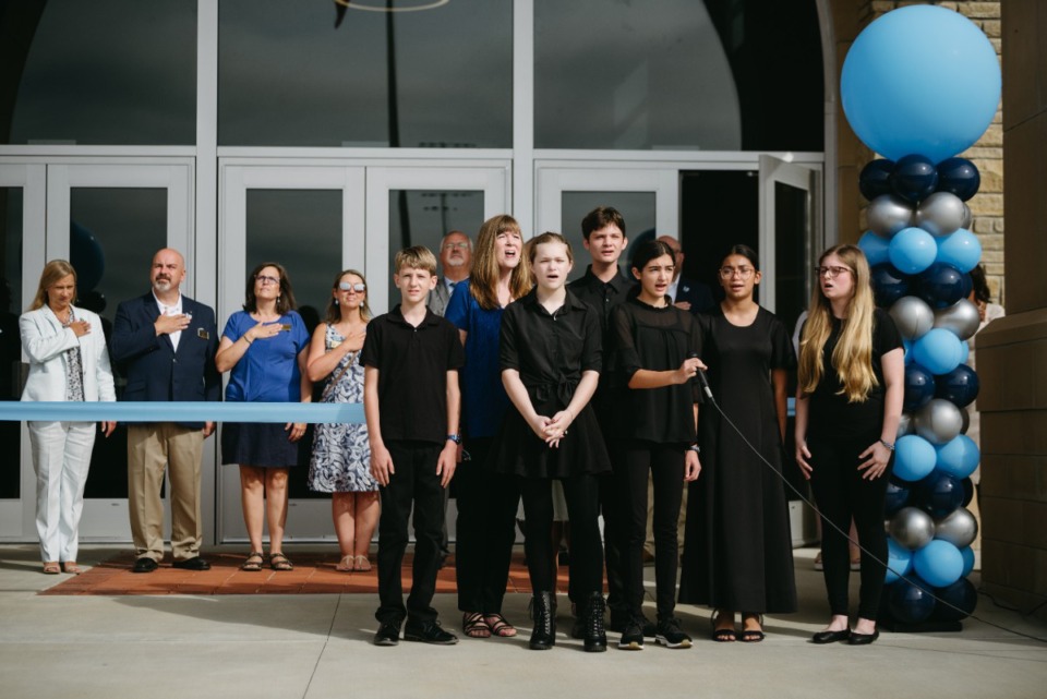 <strong>The Lakeland Preparatory School Choir sang the national anthem for the crowd at the high school&rsquo;s grand opening Saturday July 30, 2022.</strong> (Lucy Garrett/Special to The Daily Memphian)