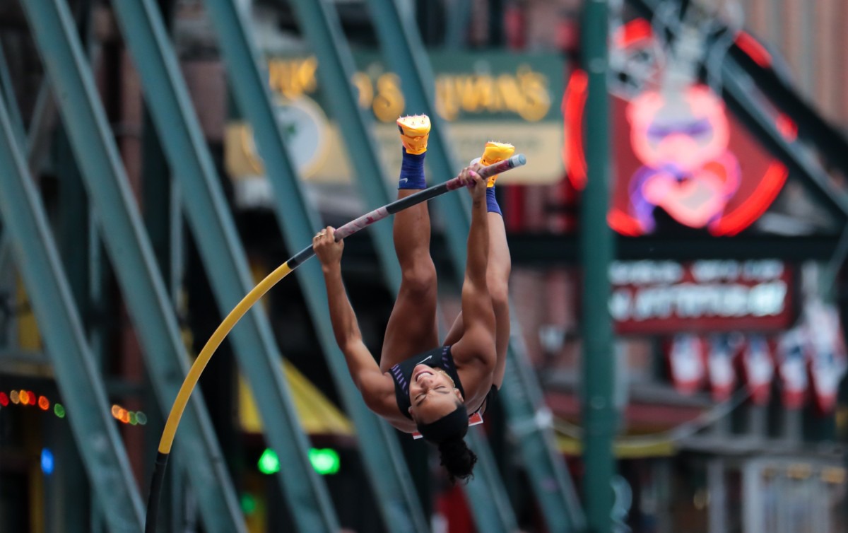 <strong>Kristen Brown goes up for the bar during the pole vault event of the Ed Murphey Classic on Beale Street, July 30, 2022.</strong> (Patrick Lantrip/Daily Memphian)