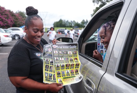 <strong>LaRonda Stone hands out flyers at Anointed Temple of Praise July 29, 2022.</strong> (Patrick Lantrip/Daily Memphian)