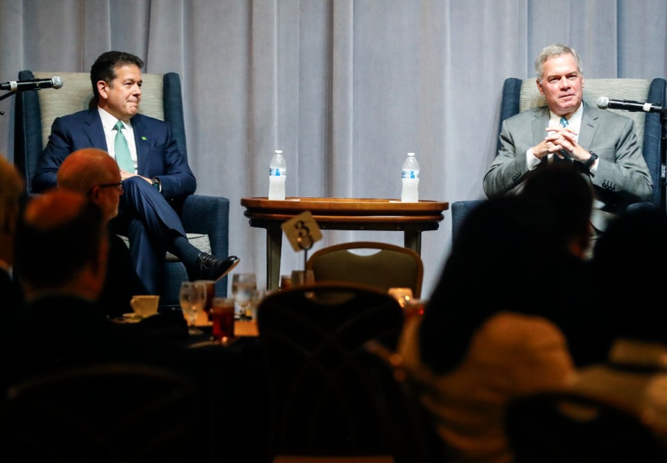 <strong>CEO of TD Bank NA, Leo Salom, (left) and CEO of First Horizon, Bryan Jordan, speak at the Positively Memphis luncheon on Monday, Aug. 1, 2022.</strong>(Mark Weber/The Daily Memphian)