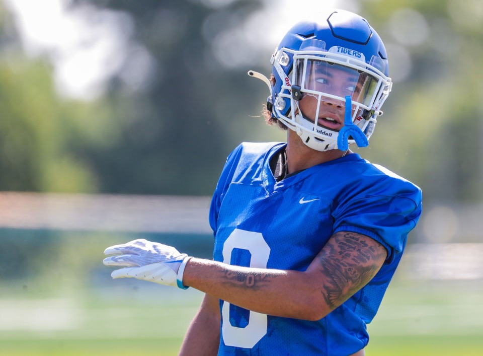 <strong>University of Memphis running back Jevyon Ducker (8) turns to listen to a coach at the Aug. 3, 2022, practice.</strong> (Patrick Lantrip/Daily Memphian)