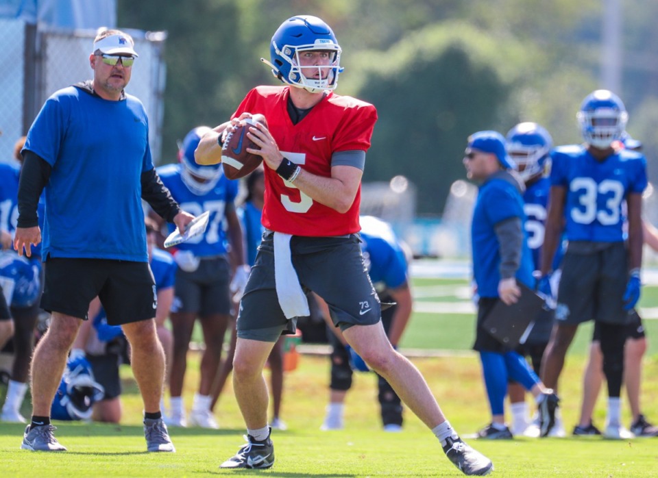 <strong>&ldquo;Not going to lie, at first I was pretty much scared to take hits, and scared to run the ball,&rdquo; said University of Memphis quarterback Seth Henigan (5).</strong> (Patrick Lantrip/Daily Memphian)