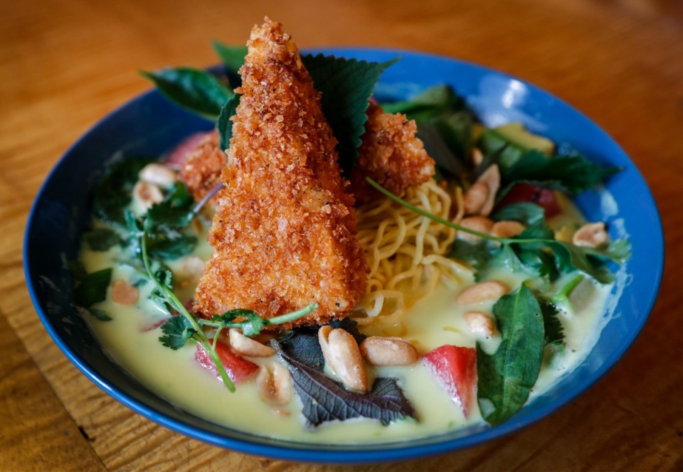 <strong>Beauty Shop&rsquo;s Lucky Pot features saffron, coconut juice, lime leaves, lemongrass and ginger broth, ramen, avocado, watermelon, herbs, peanuts, shiso, cilantro, Thai basil and rai rum</strong>. (Mark Weber/The Daily Memphian)