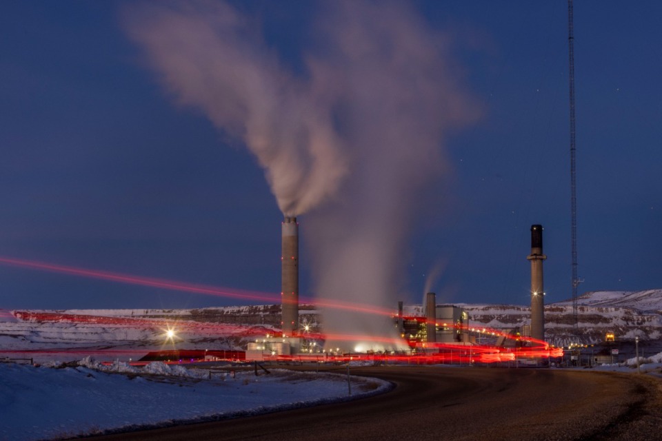 <strong>In this photo taken with a slow shutter speed, taillights trace the path of a motor vehicle at the Naughton Power Plant in Kemmerer, Wyo. Bill Gates' company TerraPower announced it had chosen Kemmerer for a nontraditional, sodium-cooled nuclear reactor that will bring on workers from a local coal-fired power plant scheduled to close soon.&nbsp;</strong> (Natalie Behring/AP file)