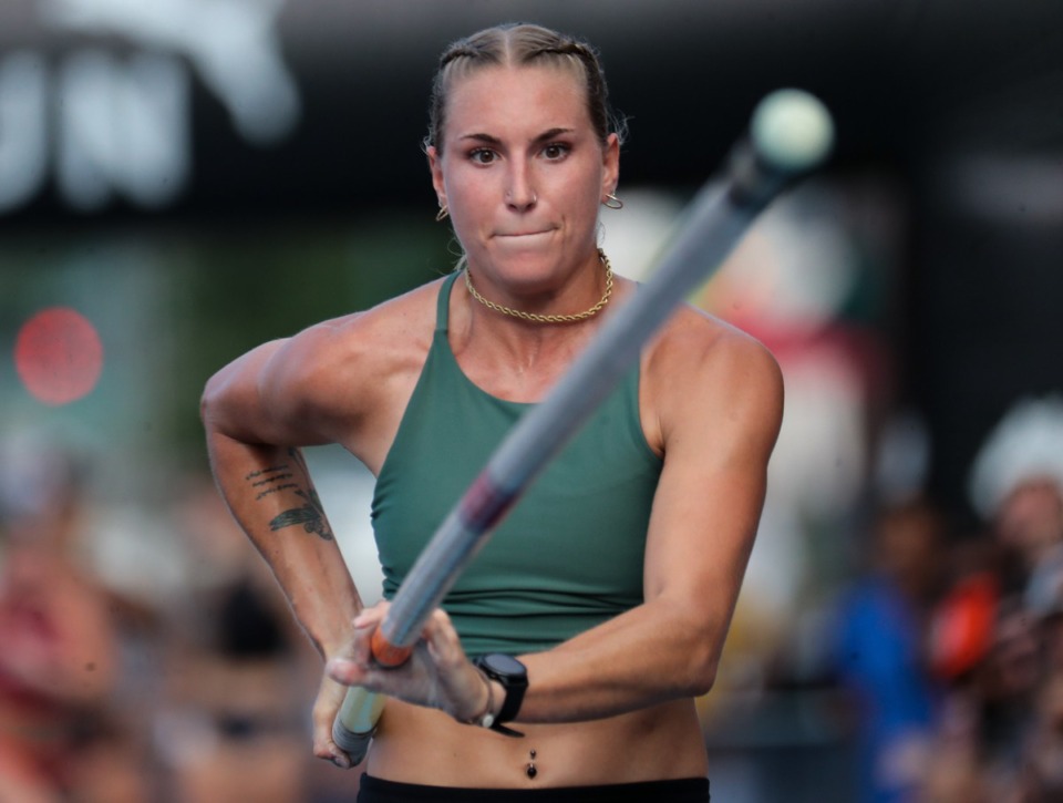 <strong>Jill Marois makes her approach during the pole vaulting portion of the Ed Murphey Classic on Beale Street.</strong> (Patrick Lantrip/Daily Memphian)