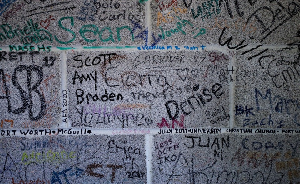 <strong>Volunteers from all over the country have signed the wall of Urban Bicycle Food Ministry's Downtown Memphis headquarters after helping out.</strong> (Patrick Lantrip/The Daily Memphian)