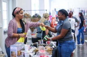 <strong>Angela Thomas sells candles from her Flavorful Living booth during the fifth annual Summer Vendor Fest at Singleton Community Center in Bartlett Aug. 6, 2022.</strong> (Patrick Lantrip/The Daily Memphian)