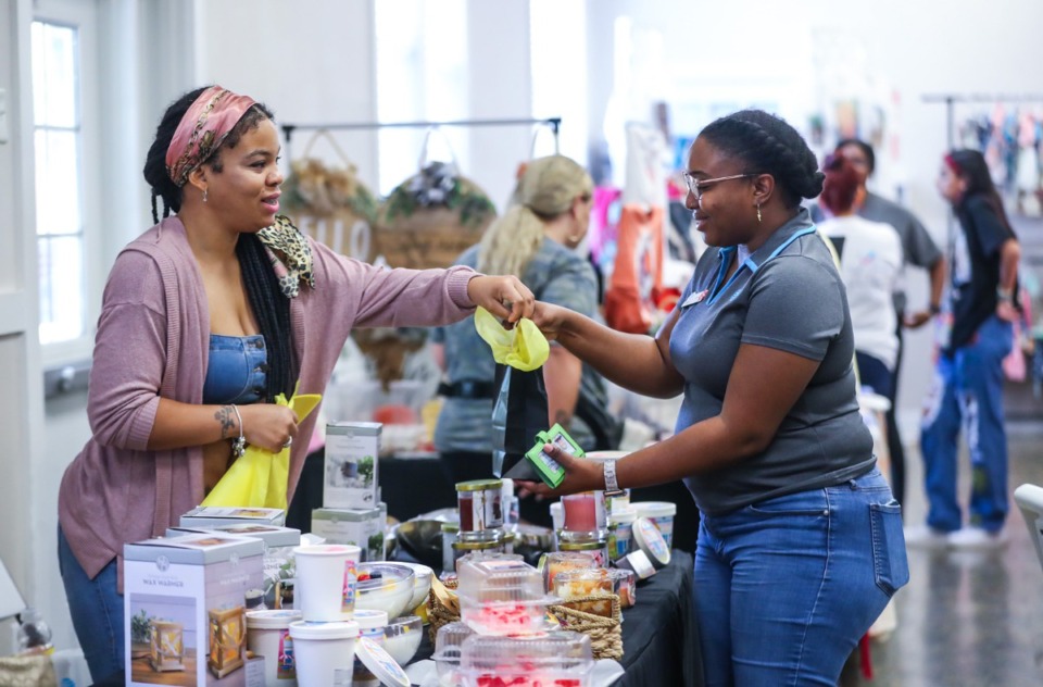<strong>Angela Thomas sells candles from her Flavorful Living booth during the fifth annual Summer Vendor Fest at Singleton Community Center in Bartlett Aug. 6, 2022.</strong> (Patrick Lantrip/The Daily Memphian)