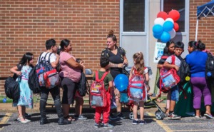 <strong>Parents wait in line for supplies and paperwork at the Memphis-Shelby County Schools back-to-school weekend festival.</strong> (Patrick Lantrip/The Daily Memphian)