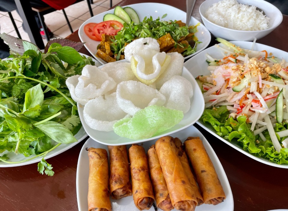 <strong>Egg rolls with lettuce and herbs, lotus salad, and the house special stir fry are favorites at Tuyen&rsquo;s Asian Bistro.&nbsp;The lotus salad is&nbsp; served with cups made of rice puffs for stuffing with salad and fish sauce.</strong>&nbsp;(Jennifer Biggs/The Daily Memphian)