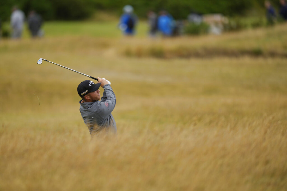 <strong>Talor Gooch of the U.S. plays a shot on the 13th fairway during the second round of the British Open golf championship on the Old Course at St. Andrews, Scotland, Friday July 15, 2022.</strong> (AP Photo/Alastair Grant)
