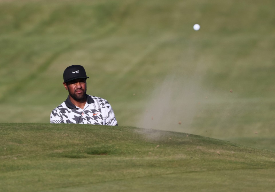 <strong>Tony Finau plays out of a bunker on 12th hole during the third round of the British Open Golf Championship at Royal St George's golf course Sandwich, England, Saturday, July 17, 2021.</strong> (AP Photo/Ian Walton)