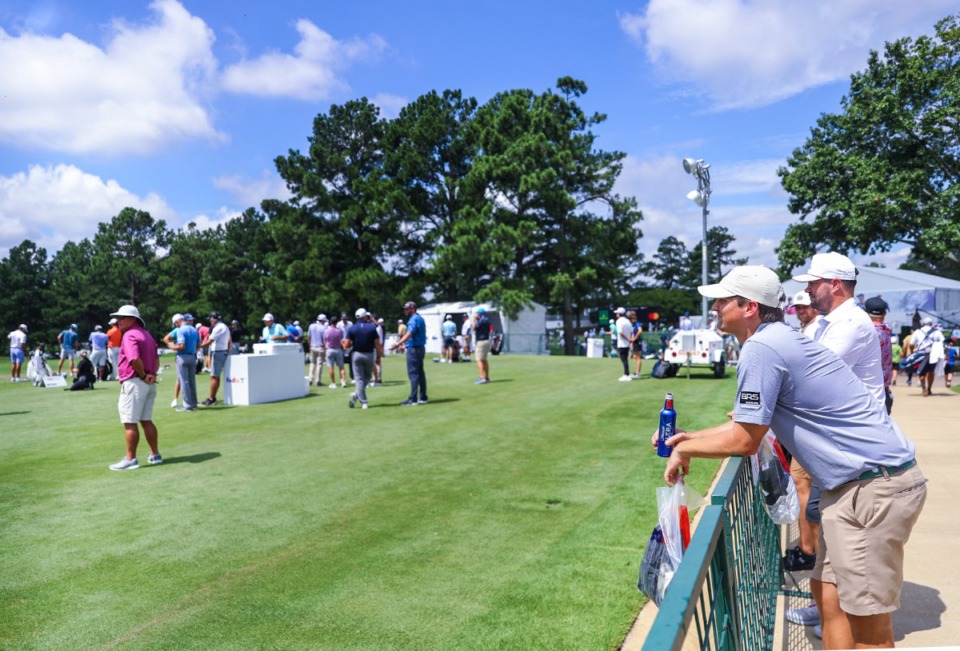 <strong>Fans watch the golfers at the driving range after the FedEx St. Jude Championship Pro-Am at TPC Southwind on Wednesday, Aug. 10.</strong> (Patrick Lantrip/Daily Memphian)