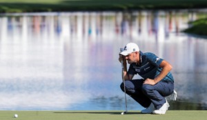 <strong>Troy Merritt eyes up his putt on the 18th green of the FedEx St. Jude Championship at TPC Southwind Aug. 13, 2022.</strong> (Patrick Lantrip/Daily Memphian)