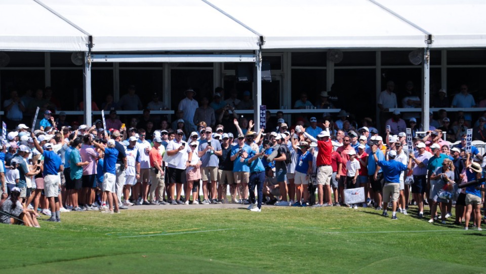 <strong>Matt Fitzpatrick hits from the crowd of the 18th hole of the FedEx St. Jude Championship at TPC Southwind Aug. 13, 2022.</strong> (Patrick Lantrip/Daily Memphian)