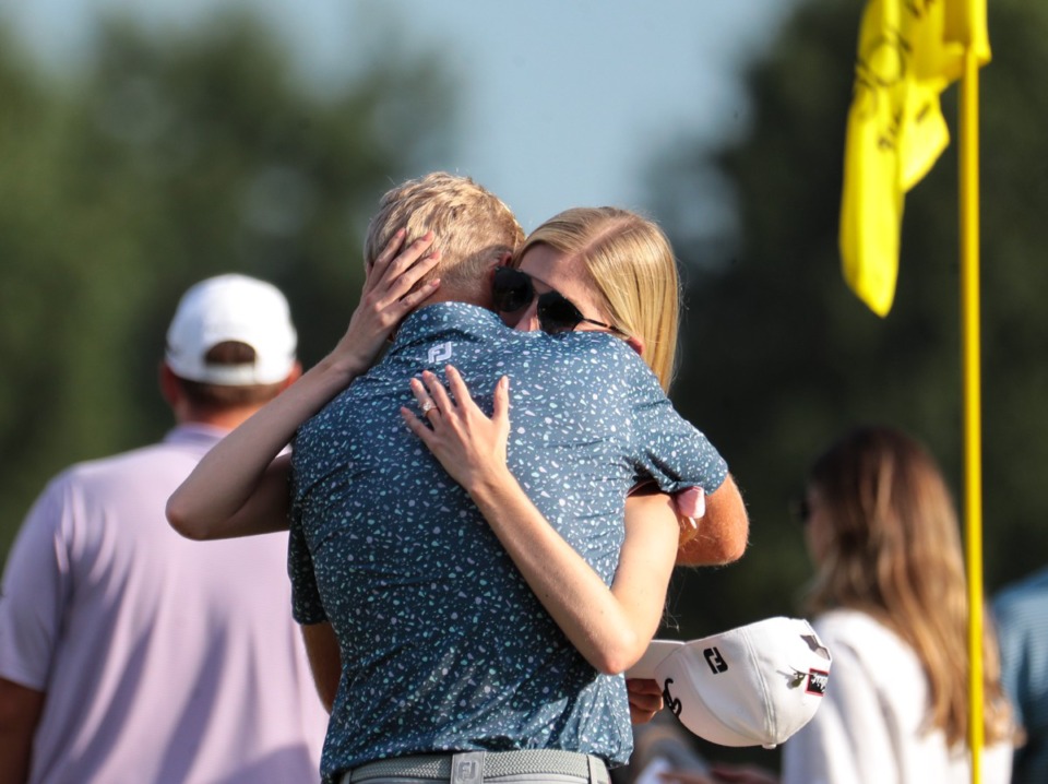 <strong>Will Zalatoris, who&rsquo;s now $2,700,000 richer, hugs his wife after winning the FedEx St. Jude Championship at TPC Southwind Aug. 14, 2022.</strong>&nbsp;(Patrick Lantrip/Daily Memphian)