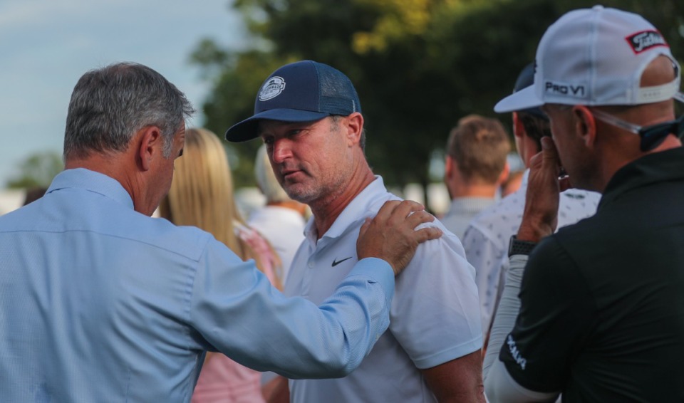 <strong>Josh Gregory, the coach of FedEx St. Jude Championship winner Will Zalatoris and Memphis native talks with PGA officials at TPC Southwind Aug. 14, 2022.</strong> (Patrick Lantrip/Daily Memphian)