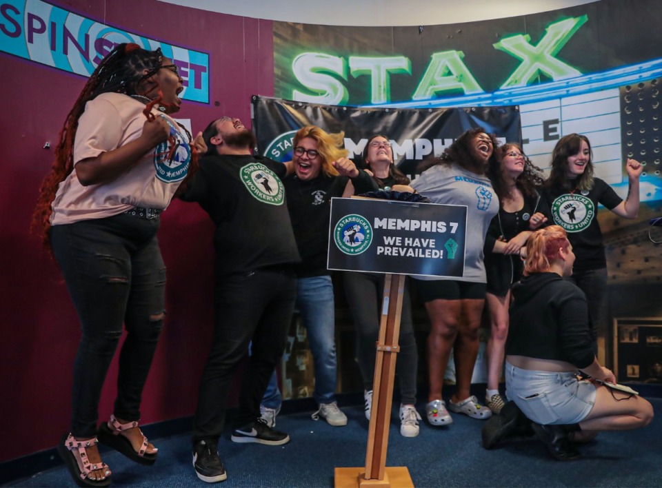 <strong>Members of the Memphis Seven, including Nabretta Hardin (from left), Beto Sanchez, Florentino Escobar, Lakota McGlawn, Nikki Taylor, Emma Worrell, Reaghan Hall and Kylie Throckmorton celebrated a successful vote to unionize their local Starbucks in June.</strong> (Patrick Lantrip/Daily Memphian file)